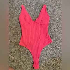 Fancy body suit for any event.